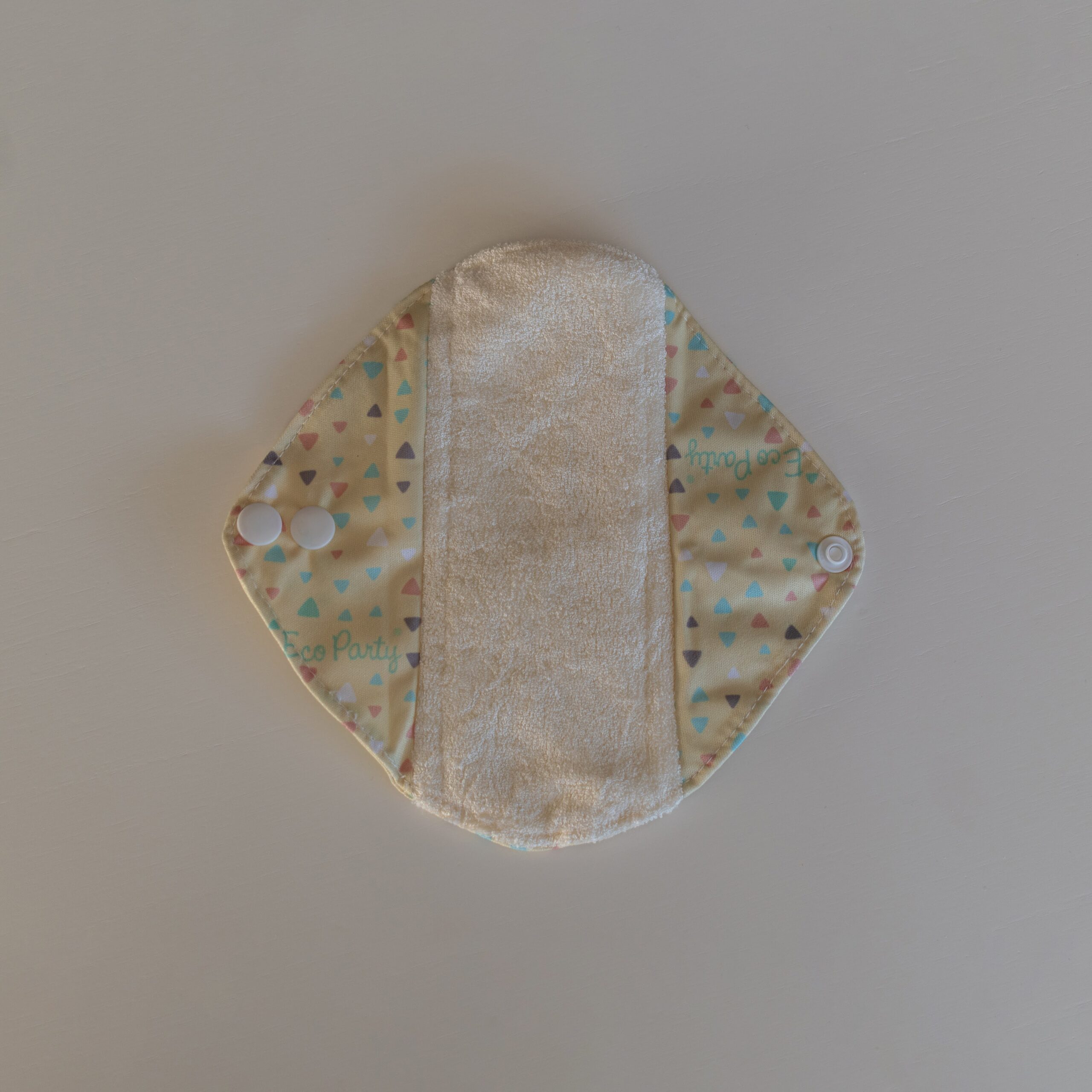 Protector diario reutilizable de algodón de mayor cobertura.