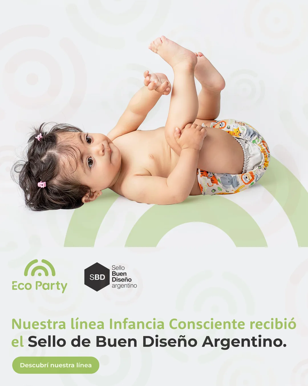 Bebé con pañal Eco Party de la línea Infancia Consciente, Sello de Buen Diseño Argentino
